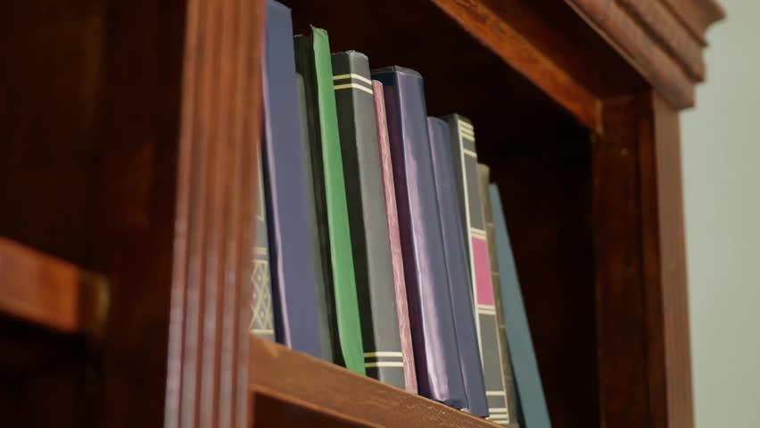 Old Antique Books on Wooden Library Shelf