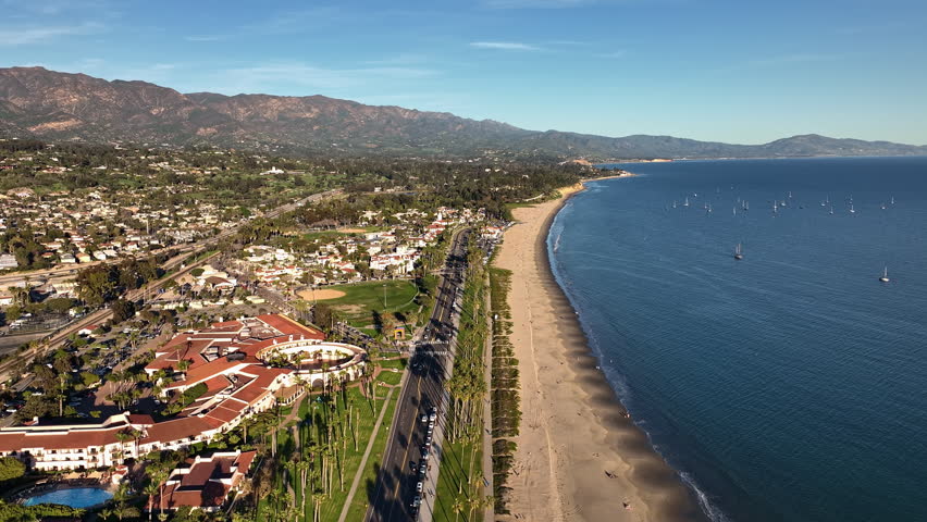 California shoreline at Santa Barbara. Aerial flight over Santa Barbara. Scenic Santa Barbara coastline. Santa Barbara suburban drone shot.