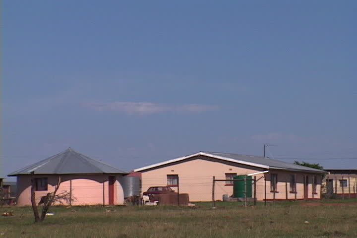 Cluster of pink buildings in village in Eastern Cape, South Africa.