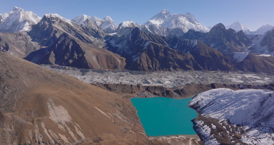 Gokyo Lake Everest region, Nepal, drone shot of the vibrant turquoise lake revealing the snow-capped summit of Mount Everest from Renjo La Pass.