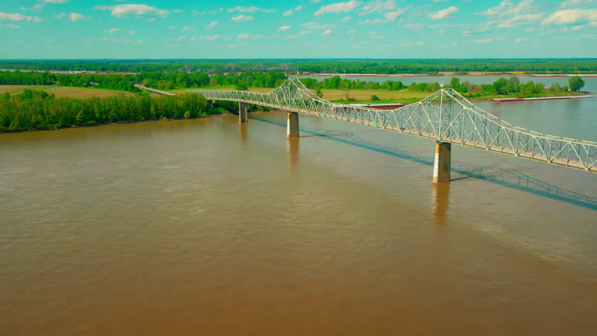 Ohio River Scenic Byway near Cairo Illinois, historic bridges and green river landscape inviting road trip travel through the American Midwest in summer.