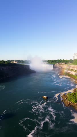 Rainbow forming over the Niagara River below Horseshoe Falls in Ontario, Canada. Niagara Falls, Canada - June 13, 2026.