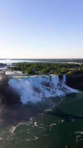 Scenic drone view of American Falls and the Niagara River landscape. Niagara Falls, Canada - June 13, 2026.