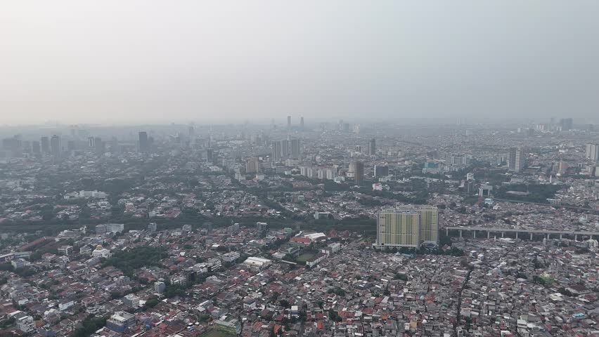 Jakarta, Indonesia, June 21, 2026: Aerial view of Central Jakarta with tall buildings and roads
