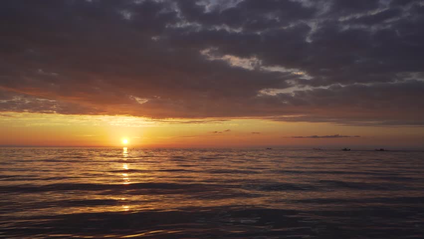 Beautiful bright sunset over the sea. Evening sea landscape.