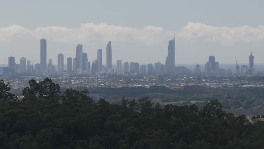 Gold Coast Hinterland Looking Towards Surfers Paradise City Skyline In Queensland, Australia. Wide Drone Shot