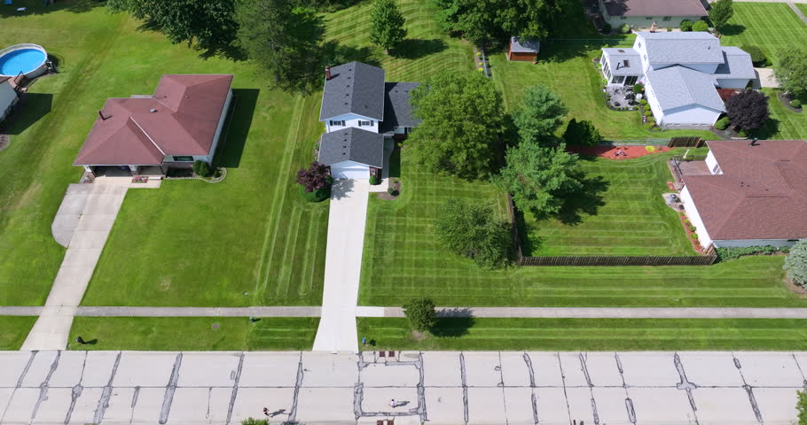 Aerial view of large private homes in Cleveland, Ohio residential area. New family houses as example of real estate development in USA suburbs.