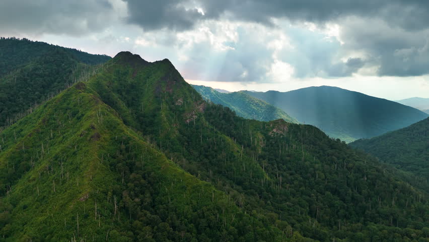 Chimney Tops peaks in Great Smoky Mountains in summer season. Mountain wooded hills in Tennessee Appalachians, USA.