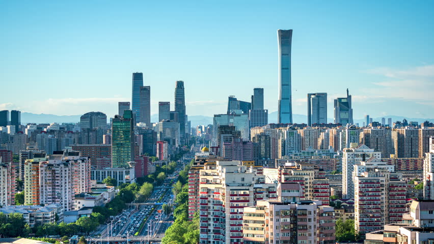 Panoramic time-lapse video of urban development in Beijing, the capital city of China, including residential areas and core business building complexes.