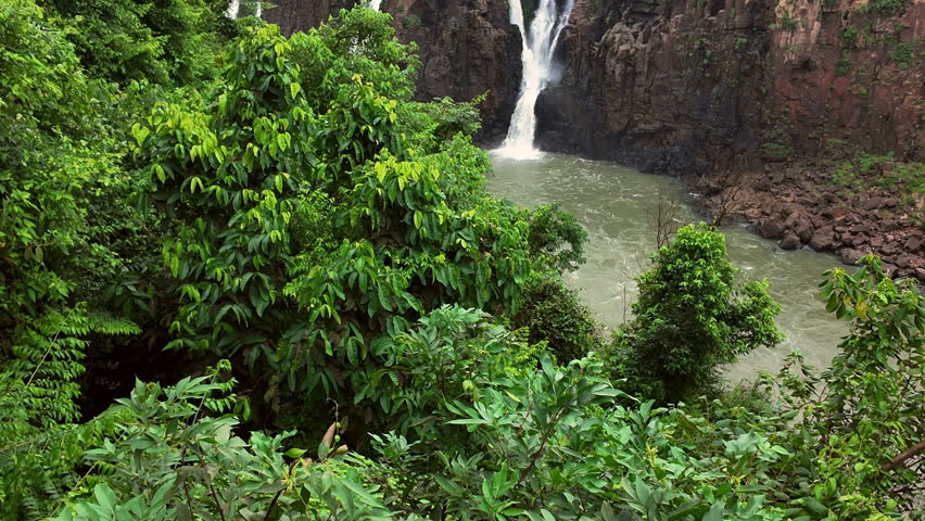 Water rushes over scenic waterfall, Iguazu Falls, Foz de Iguazu National Park, Brazil