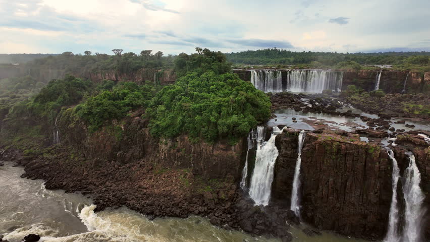 Water rushes over scenic waterfall, Iguazu Falls, Foz de Iguazu National Park, Brazil