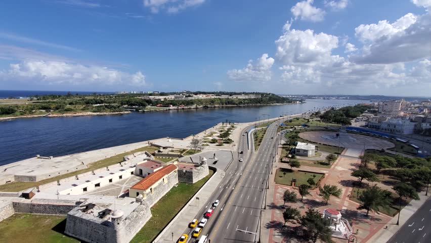 Aerial view of the historic Castle of the Three Kings of Morro overlooking the bay with coastal roads and city architecture in Havana, Havana, Cuba.