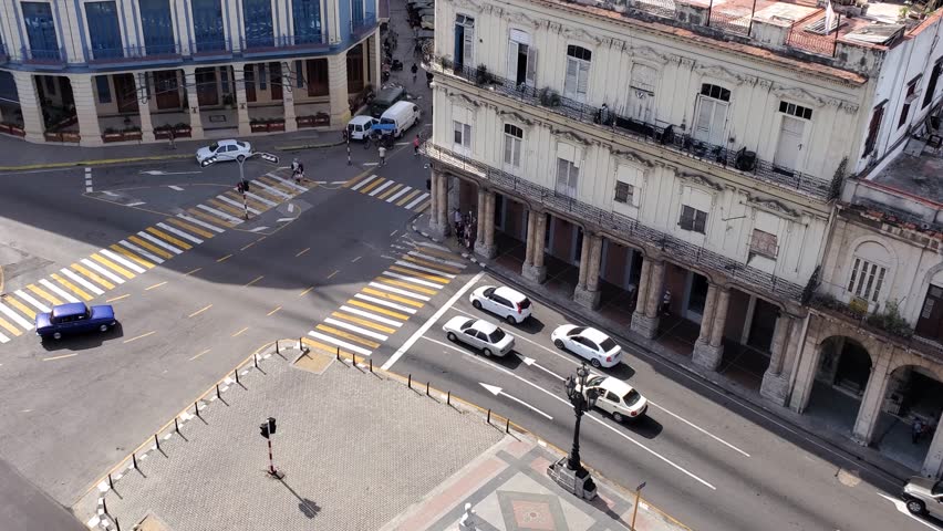 Aerial view of the historic Paseo del Prado intersection with classic cars and colonial architecture in Havana, Havana, Cuba.