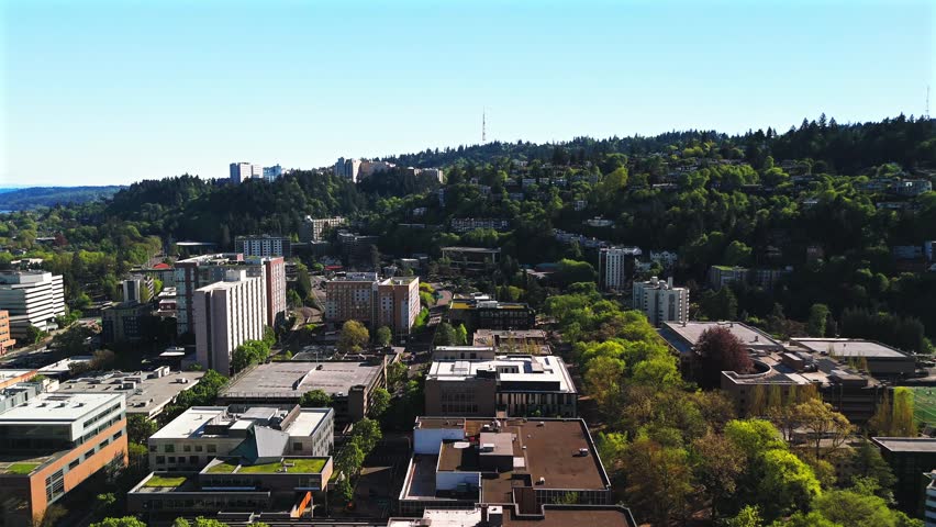 Portland Oregon Skyline Aerial View Over Green City Hills and Willamette River