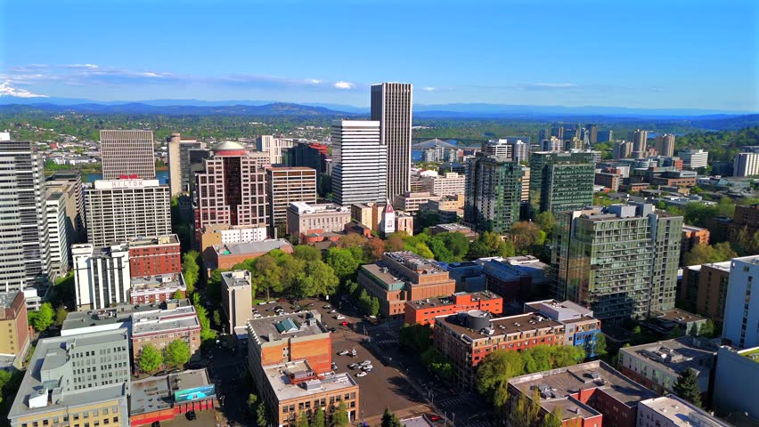Portland Oregon Summer Skyline Aerial View With Cascade Mountains and Blue Sky