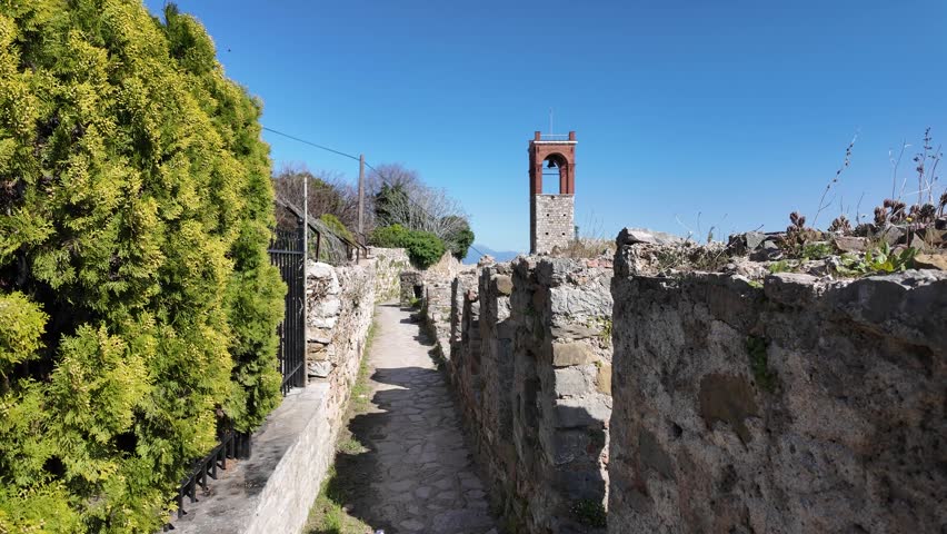 Nafpaktos, Aetolia Acarnania, Western Greece - March 15th, 2026 - aerial and street footage of the historical town, venetian harbor, venetian castle and fortress, clock tower, architecture, boats, former mosques, beaches and the landscapes around