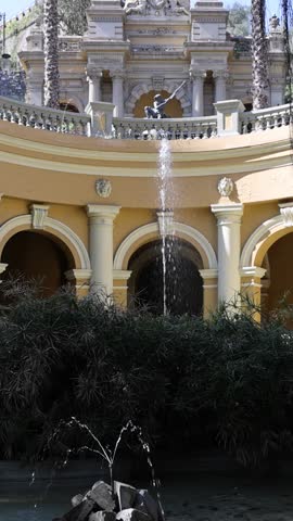 View of the historic fountain at Cerro Santa Lucia with ornate stone architecture and lush greenery in Santiago, Santiago Metropolitan, Chile.