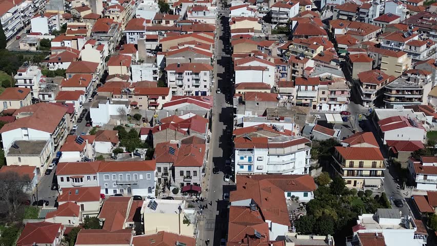 Nafpaktos, Aetolia Acarnania, Western Greece - March 15th, 2026 - aerial and street footage of the historical town, venetian harbor, venetian castle and fortress, clock tower, architecture, boats, former mosques, beaches and the landscapes around