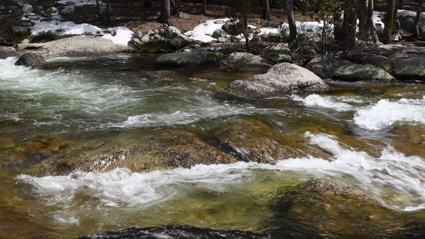 Water running after snow melt near Tiago Pass, Yosemite National Park, USA