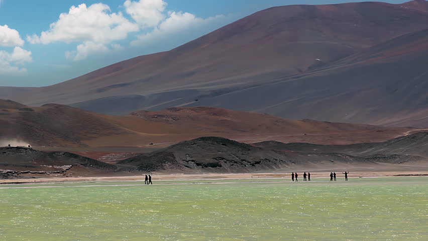 Wide Shot of Travelers Exploring Piedras Rojas in Atacama Desert Chile - 4K