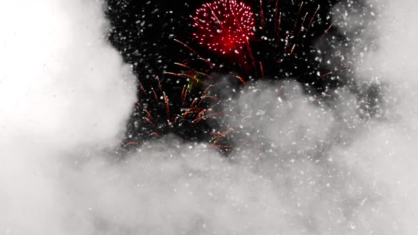 This video captures explosive fireworks and lightning effects illuminating the night sky with bright colors, sparks, smoke