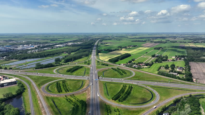 Aerial view of a large highway cloverleaf junction near Heerenveen in Friesland, Netherlands, Europe.