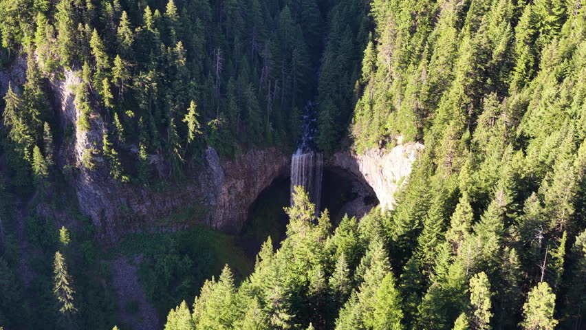 The picturesque Tamawanas Falls flows through Mt. Hood National Forest which spans from Mt Hood to the Columbia River Gorge in Oregon. This scenic area, near Portland, offers year-round recreation.