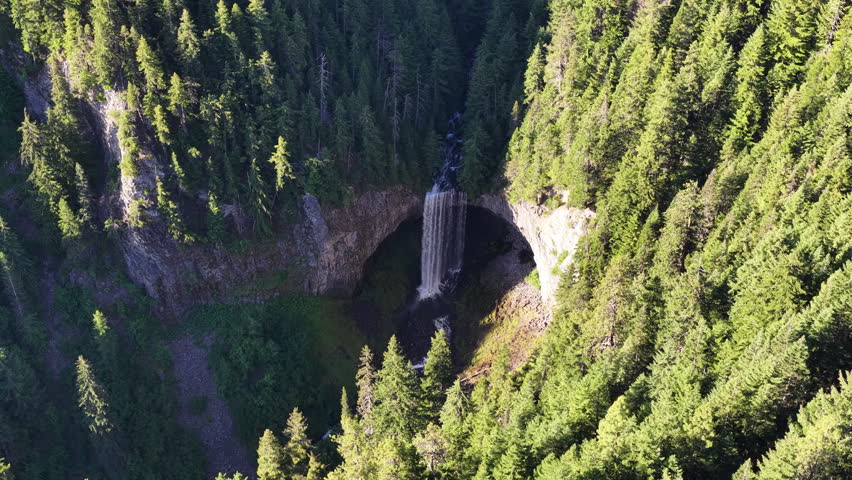 The picturesque Tamawanas Falls flows through Mt. Hood National Forest which spans from Mt Hood to the Columbia River Gorge in Oregon. This scenic area, near Portland, offers year-round recreation.