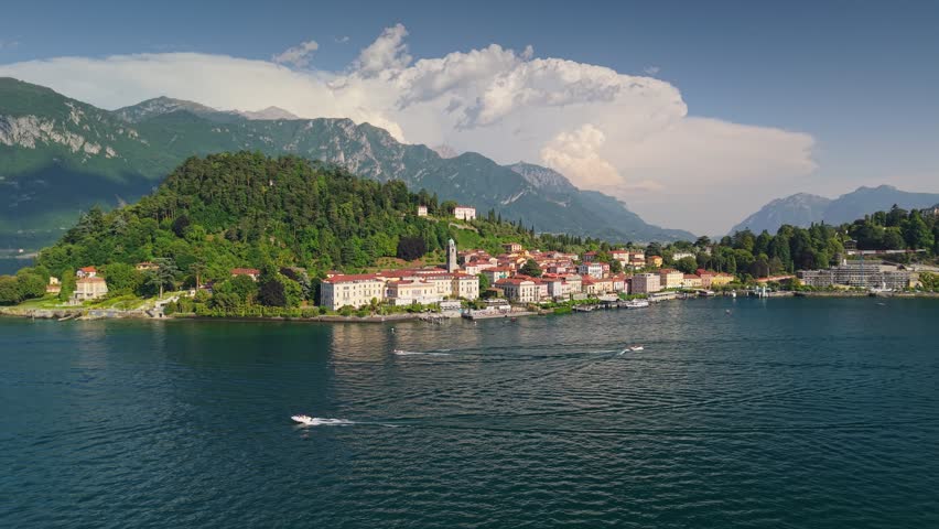 Aerial view of Bellagio luxury town on famous Lake Como. Bellagio coastal villas and waterfront hotels from above, Italy