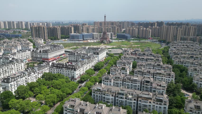 Aerial View of Hangzhou’s "French City" is Tianducheng (天都城), a massive residential development in the Linping District designed as an exact replica of Paris. Drone Raw shot.
