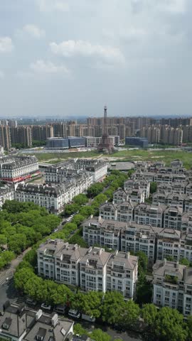 Vertical Aerial View of Hangzhou’s "French City" is Tianducheng (天都城), a massive residential development in the Linping District designed as an exact replica of Paris. Drone Raw shot.