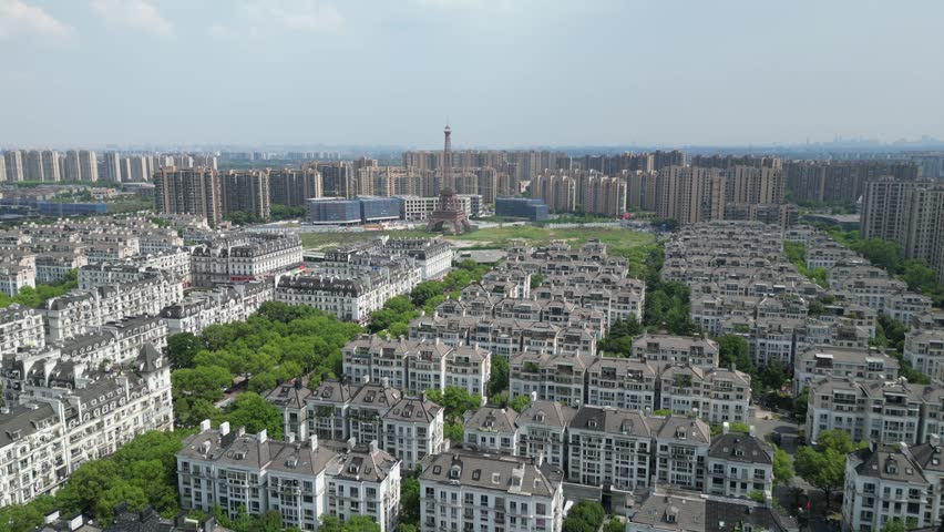 Aerial View of Hangzhou’s "French City" is Tianducheng (天都城), a massive residential development in the Linping District designed as an exact replica of Paris. Drone Raw shot.