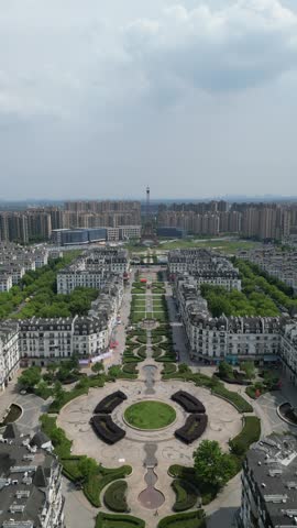 Vertical Aerial View of Hangzhou’s "French City" is Tianducheng (天都城), a massive residential development in the Linping District designed as an exact replica of Paris. Drone Raw shot.