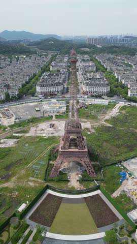 Vertical Aerial View of Hangzhou’s "French City" is Tianducheng (天都城), a massive residential development in the Linping District designed as an exact replica of Paris. Drone Raw shot.