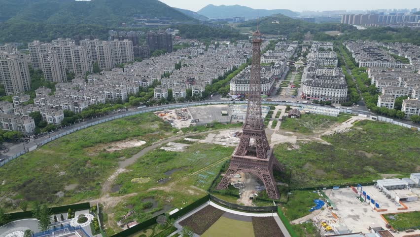 Aerial View of Hangzhou’s "French City" is Tianducheng (天都城), a massive residential development in the Linping District designed as an exact replica of Paris. Drone Raw shot.
