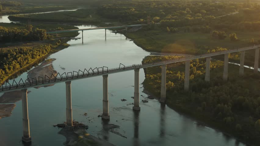Aerial footage of High Trestle Trail Bridge with stunning sun flare