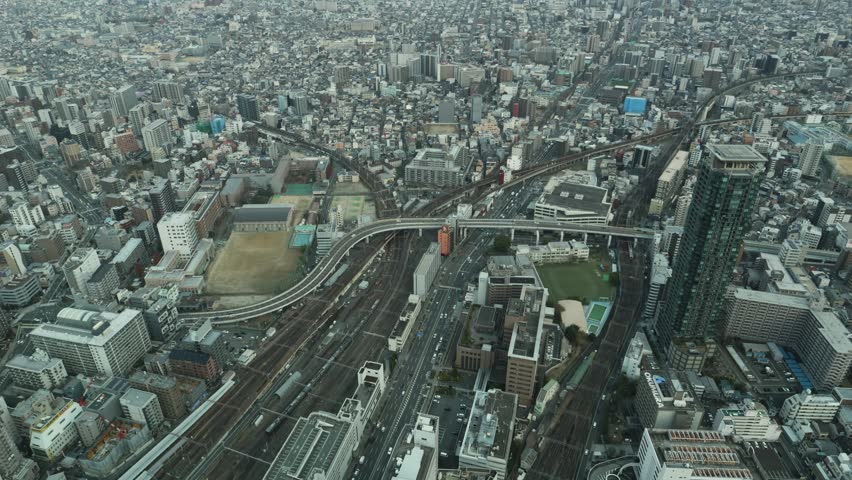 Osaka cityscape and railway viewed from a high building in Japan