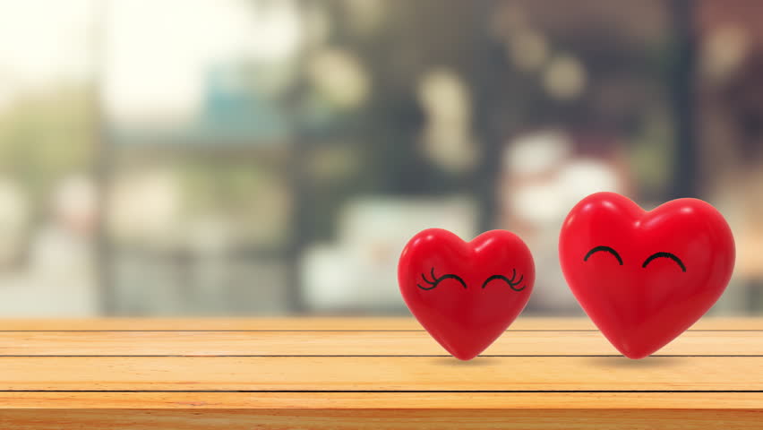 Smiling Love Hearts On Wooden Table
