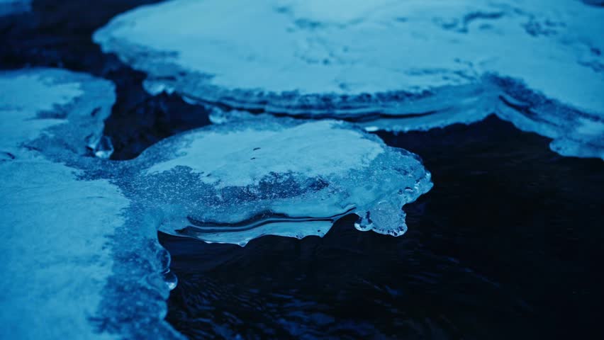 Ice On The River Slowly Melts In Spring. Close-up Shot