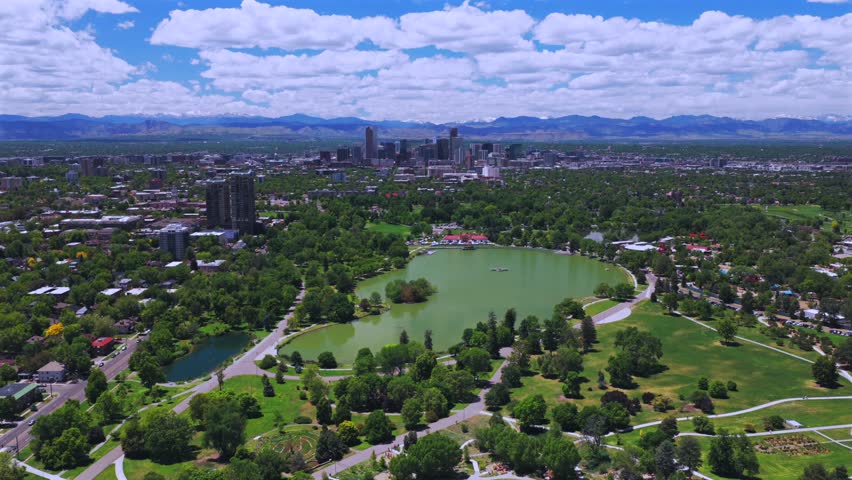 Springtime Denver Pavilions City Park sunny morning blue sky clouds cityscape downtown Denver Mile High skyline Colorado aerial drone Front Range foothills Rocky Mountains Ferril Lake Neighborhood