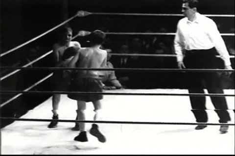 1940s - An amateur boxing match in 1948. includes child boxers.