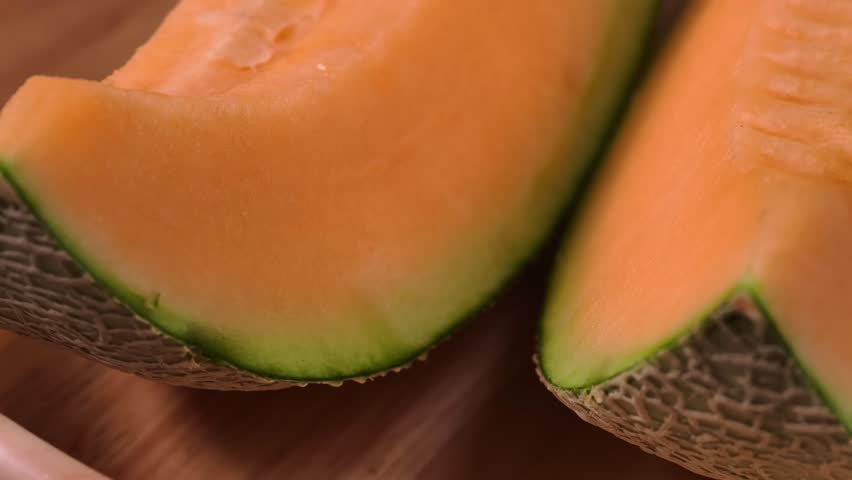 Sliced pieces of fresh sweet cantaloupe melon