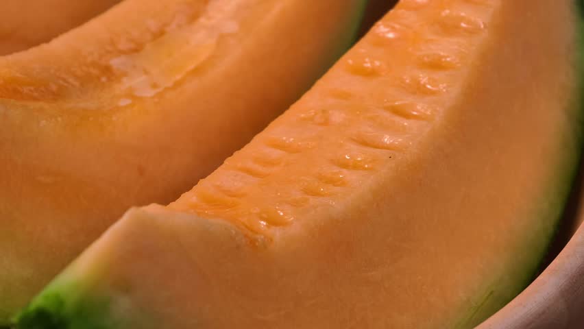 Sliced pieces of fresh sweet cantaloupe melon