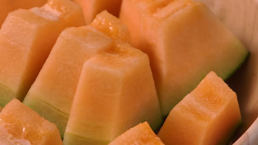 Sliced pieces of fresh sweet cantaloupe melon