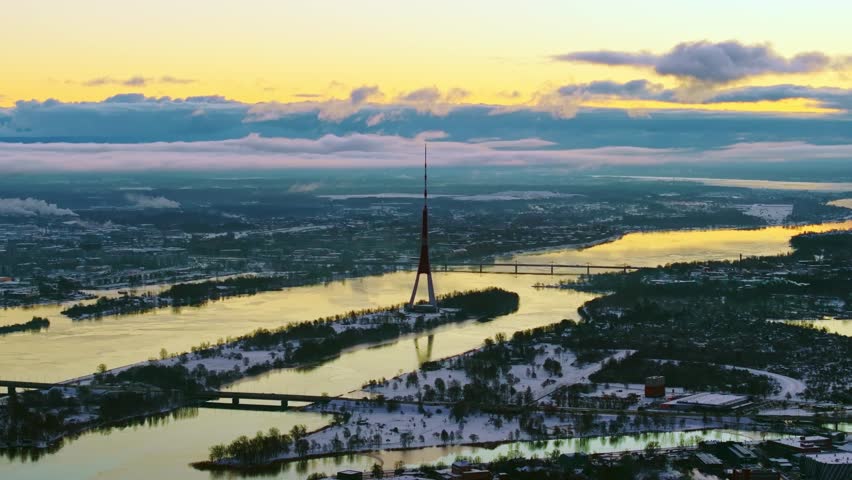 Panoramic Riga Skyline With TV Tower Above Daugava at Winter Dawn Light