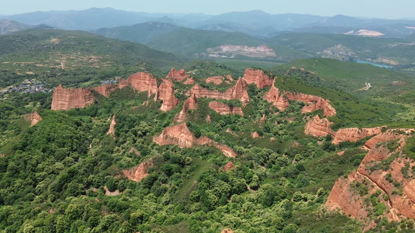 Aerial drone footage of Las Médulas Spain ancient Roman gold mines and spectacular red rock landscape in León