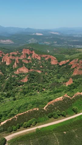Aerial drone footage of Las Médulas Spain ancient Roman gold mines and spectacular red rock landscape in León