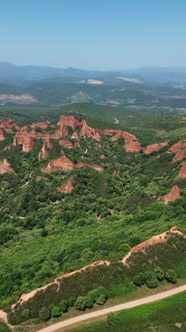 Aerial drone footage of Las Médulas Spain ancient Roman gold mines and spectacular red rock landscape in León