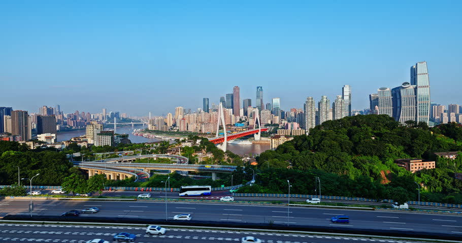 Modern suspension bridge across the Yangtze River with city skyline in Chongqing, China