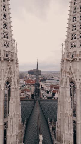 Unique aerial view between the spires of an old cathedral in Vienna.